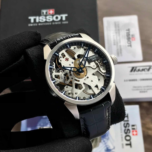 Shop the Tissot T-Complication Squelette firstcopy Mechanical Skeleton Men’s Watch—open-worked design, exposed movement, and premium mechanical craftsmanship for collectors.